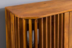 Massives Sideboard SCULPTURA 170cm braun Mangoholz mit abgerundeter Lamellenfront
