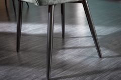 Design Stuhl MILANO grün Samt mit Armlehne Ziersteppung gepolstert schwarze Metallbeine