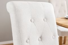 Design Stuhl CASA beige Strukturstoff Massivholzbeine mit Zierknöpfen und Nackenrolle