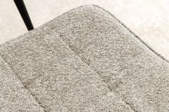 Moderner Hocker SCANDINAVIA champagner greige Bouclé schwarze Metallbeine Fußhocker