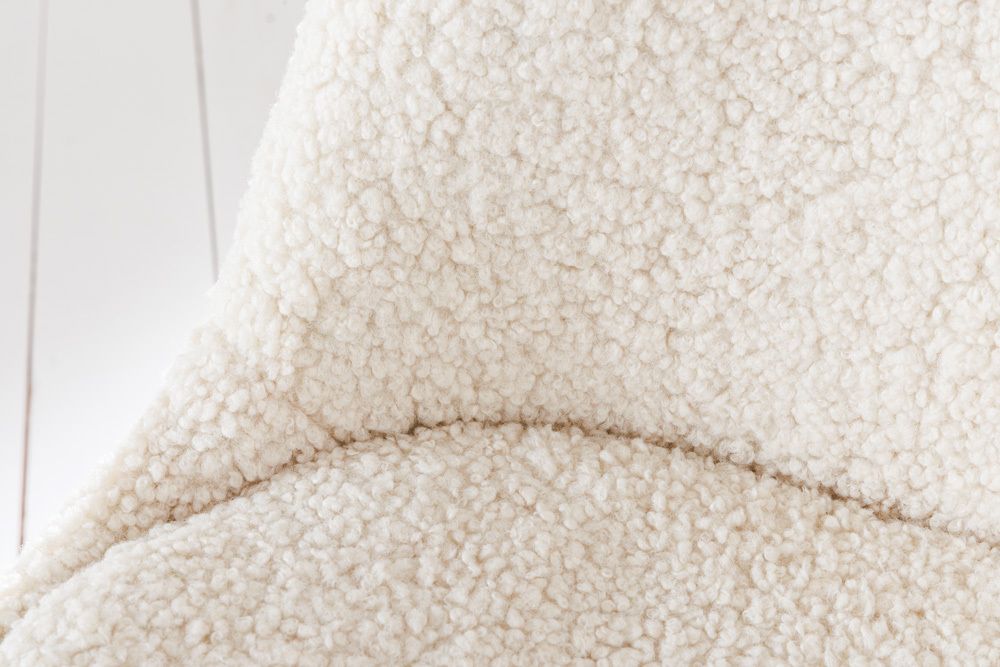 Design Stuhl SCANDINAVIA MEISTERSTÜCK creme Bouclé schwarze Metallbeine