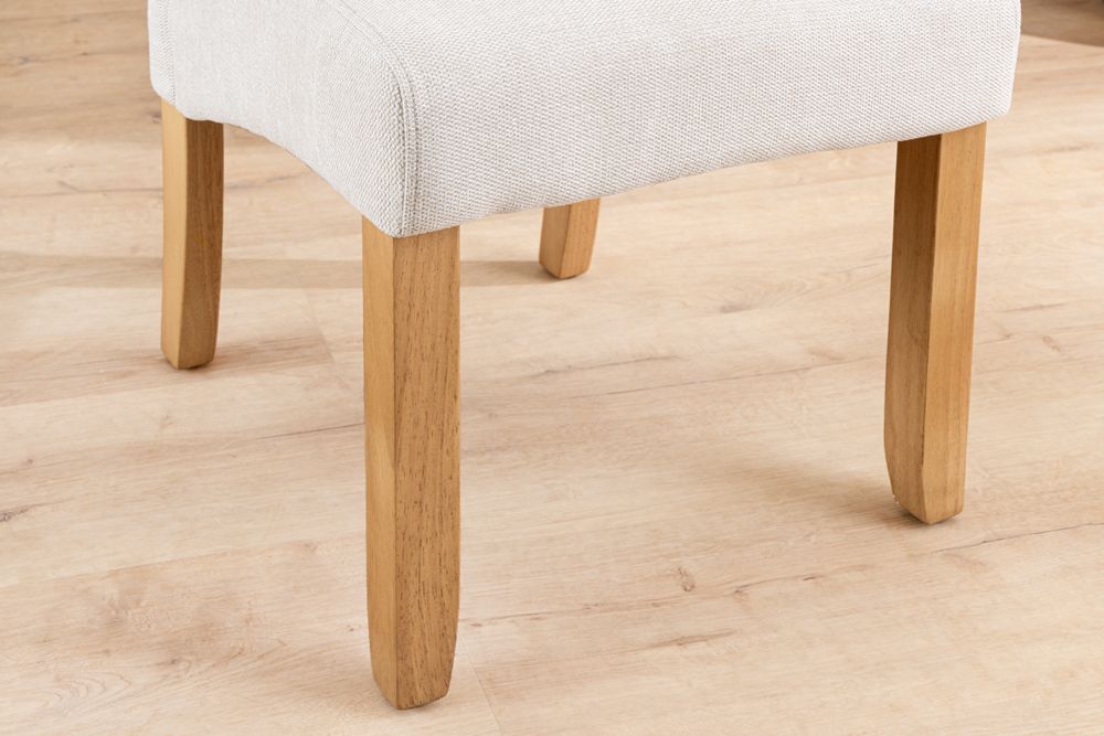 Design Stuhl CASA beige Strukturstoff Massivholzbeine mit Zierknöpfen und Nackenrolle