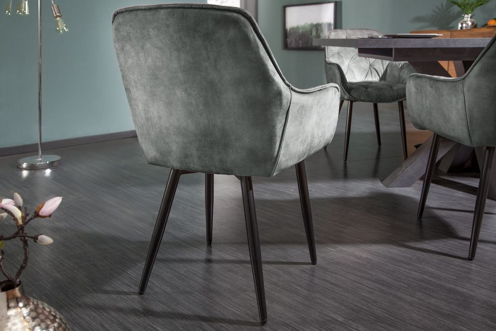 Design Stuhl MILANO grün Samt mit Armlehne Ziersteppung gepolstert schwarze Metallbeine