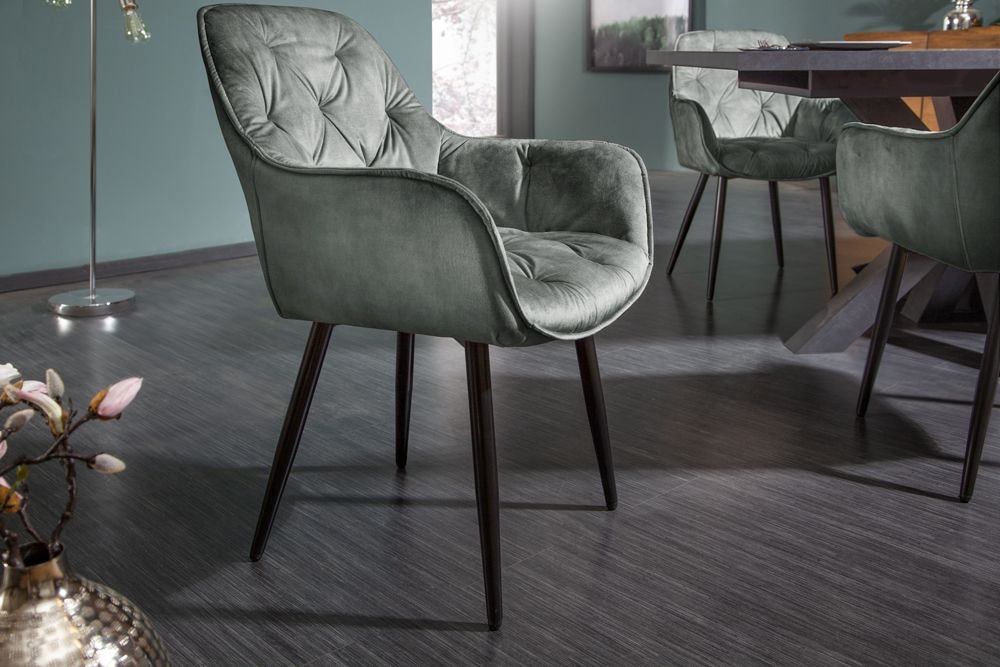 Design Stuhl MILANO grün Samt mit Armlehne Ziersteppung gepolstert schwarze Metallbeine