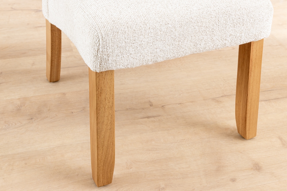 Design Stuhl CASA beige Bouclé Tweed Soft Massivholzbeine Zierknöpfe und Nackenrolle