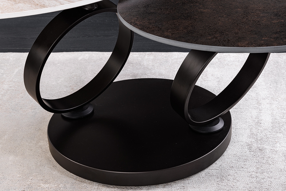 Design Couchtisch DANCING RINGS rost rund drehbar Travertin Keramik schwarz Gestell