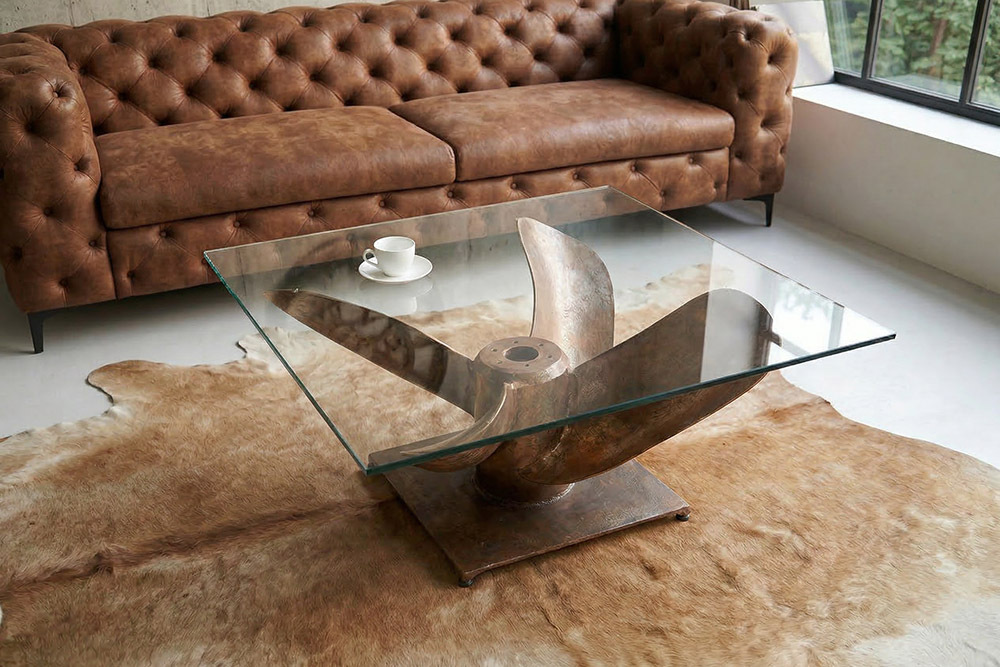Maritimer Couchtisch OCEAN L 85cm antik kupfer mit Schiffsschraube und Glasplatte