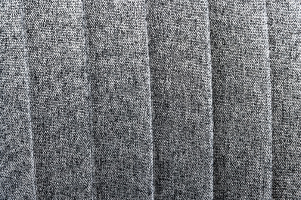Drehbarer Sessel LOUNGER grau Strukturstoff Metallgestell schwarz