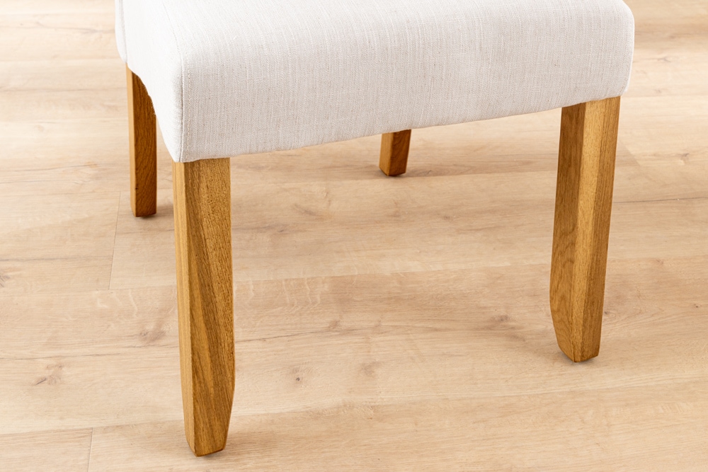Design Stuhl CASA beige Leinen Massivholzbeine mit Zierknöpfen und Nackenrolle